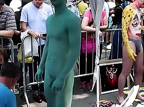 Naked Asian Lad's body is painted nigh mention