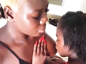 French African Lesbian Sucks Heavy Natural Tits